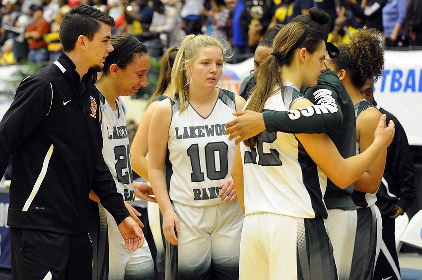 Lakewood Ranch assistant coach Karter Clark and players Elise Spiller, Rhiannon Jacobson, Kyra Klarkowski and Aleah Robinson react after finishing as the state runner-up.