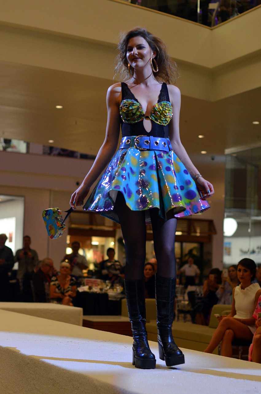 Tessa Elizabeth Merkel models Dari Goggans's '1991 was a good year' — made from vinyl and spray paint