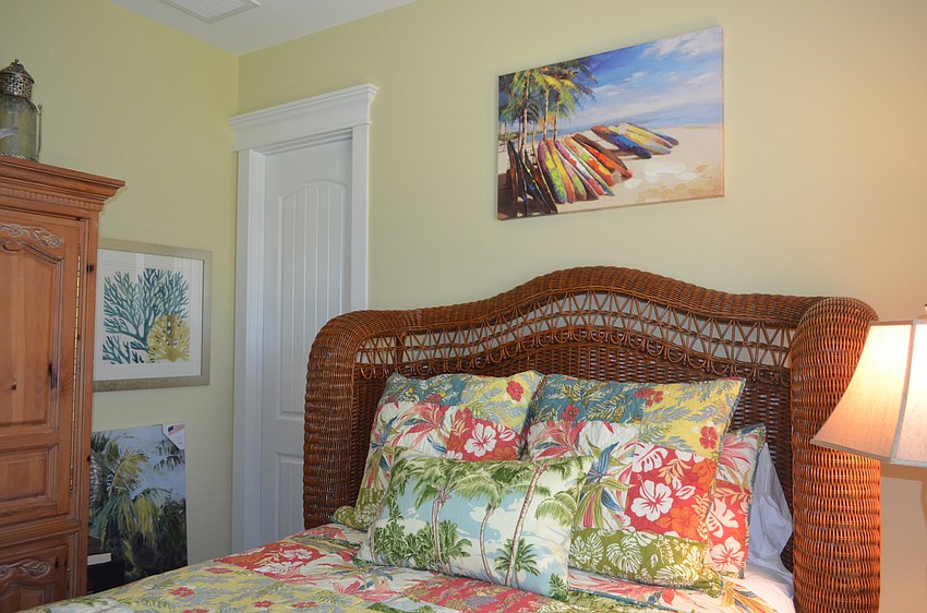 The guest room in the main house was decorated with bright island colors.
