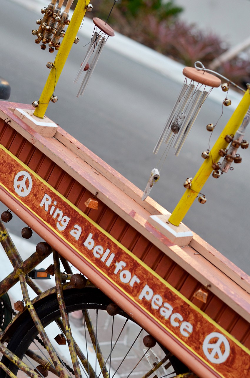 'Ring a bell for peace' bike was outside of Florida Theatre Studio for the event.