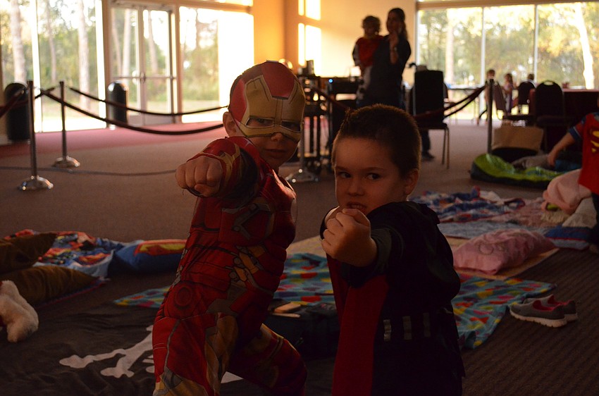 Adir Tivi and Cal Nykorchuck strike their superhero poses.