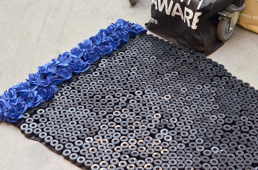 The details of the train on Samantha Kelly's dress.