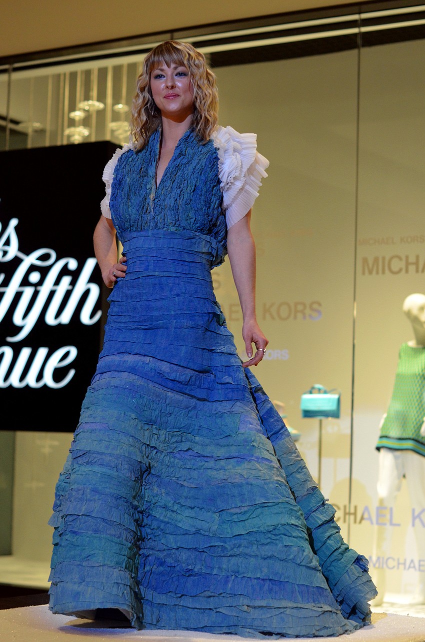 Ella Hillebrand models Eric Cross's 'She Sees The Sea' — made from polystyrene sheeting, paper sheeting for packing and crinkled polystyrene sheeting