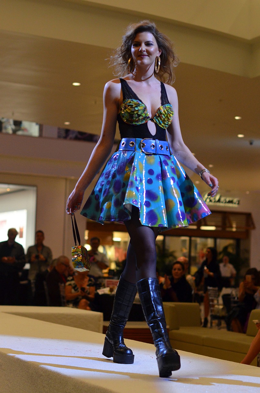 Tessa Elizabeth Merkel models Dari Goggans's '1991 was a good year' — made from vinyl and spray paint