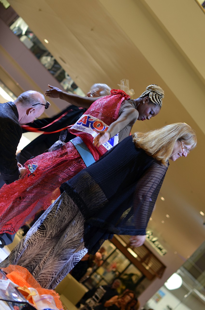 Gwen Thomas models for the special presentation by John Karl before the start of the show.