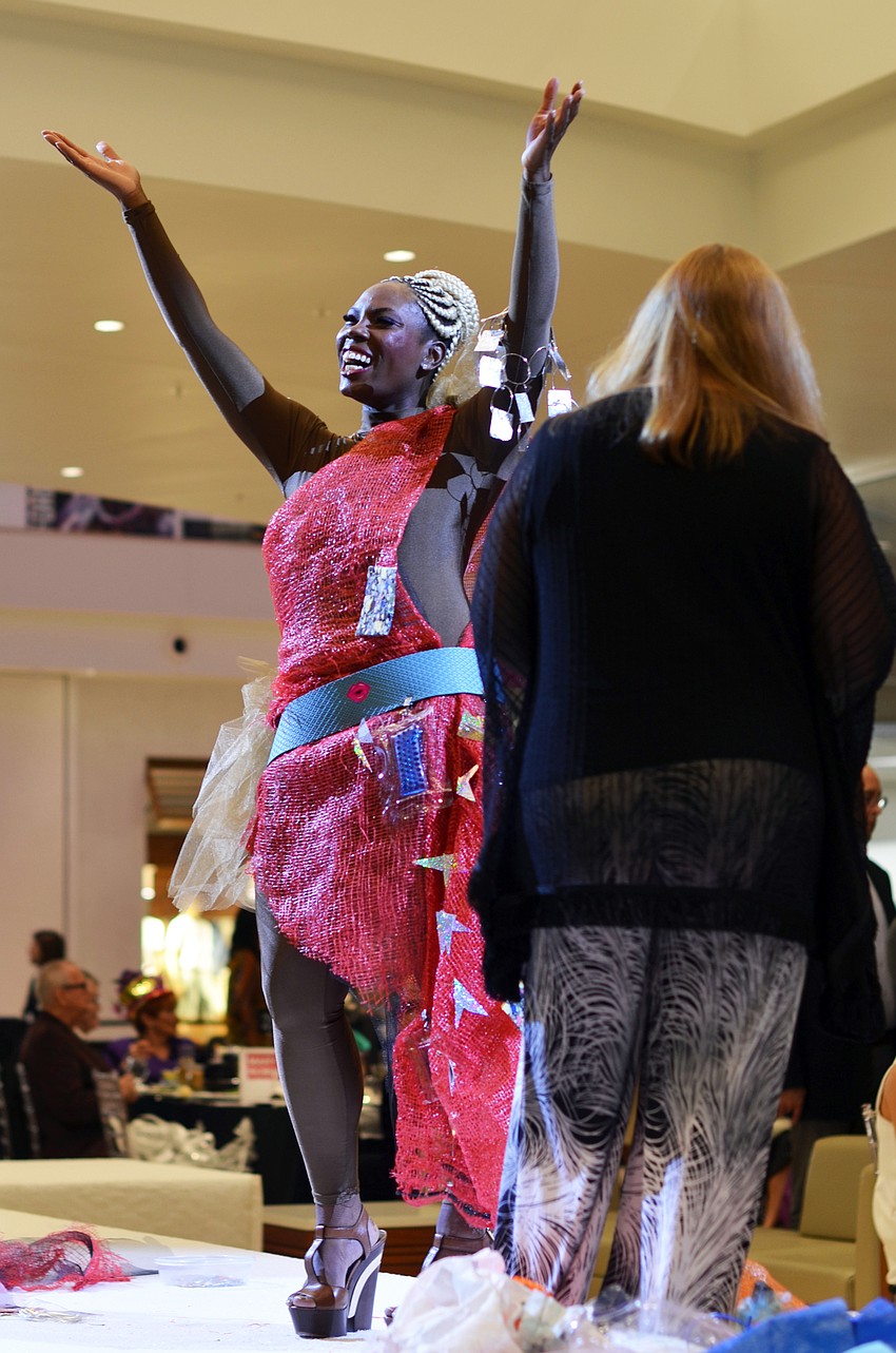 Gwen Thomas models for the special presentation by John Karl before the start of the show.