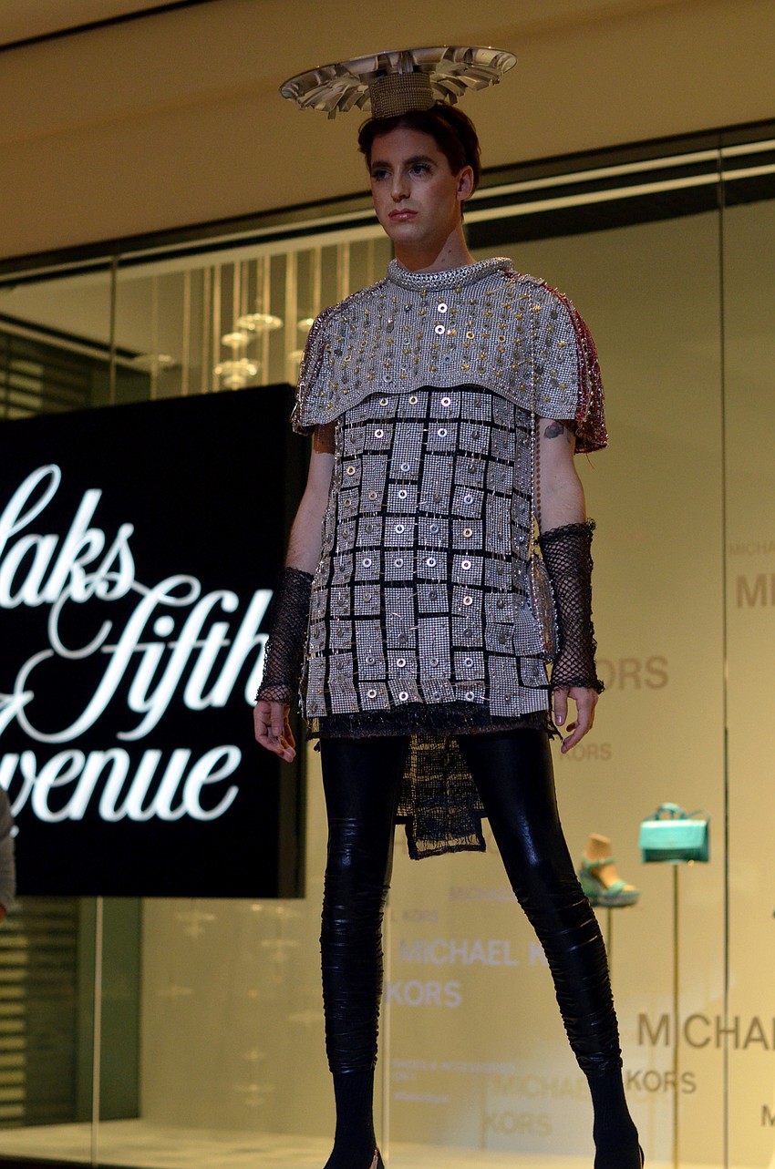 Michael O'Hara models Ray Pepper's 'Joan of Arc meets Prince Valiant' — made from safety pins, silver washers, onion bags and rubber shelf liner