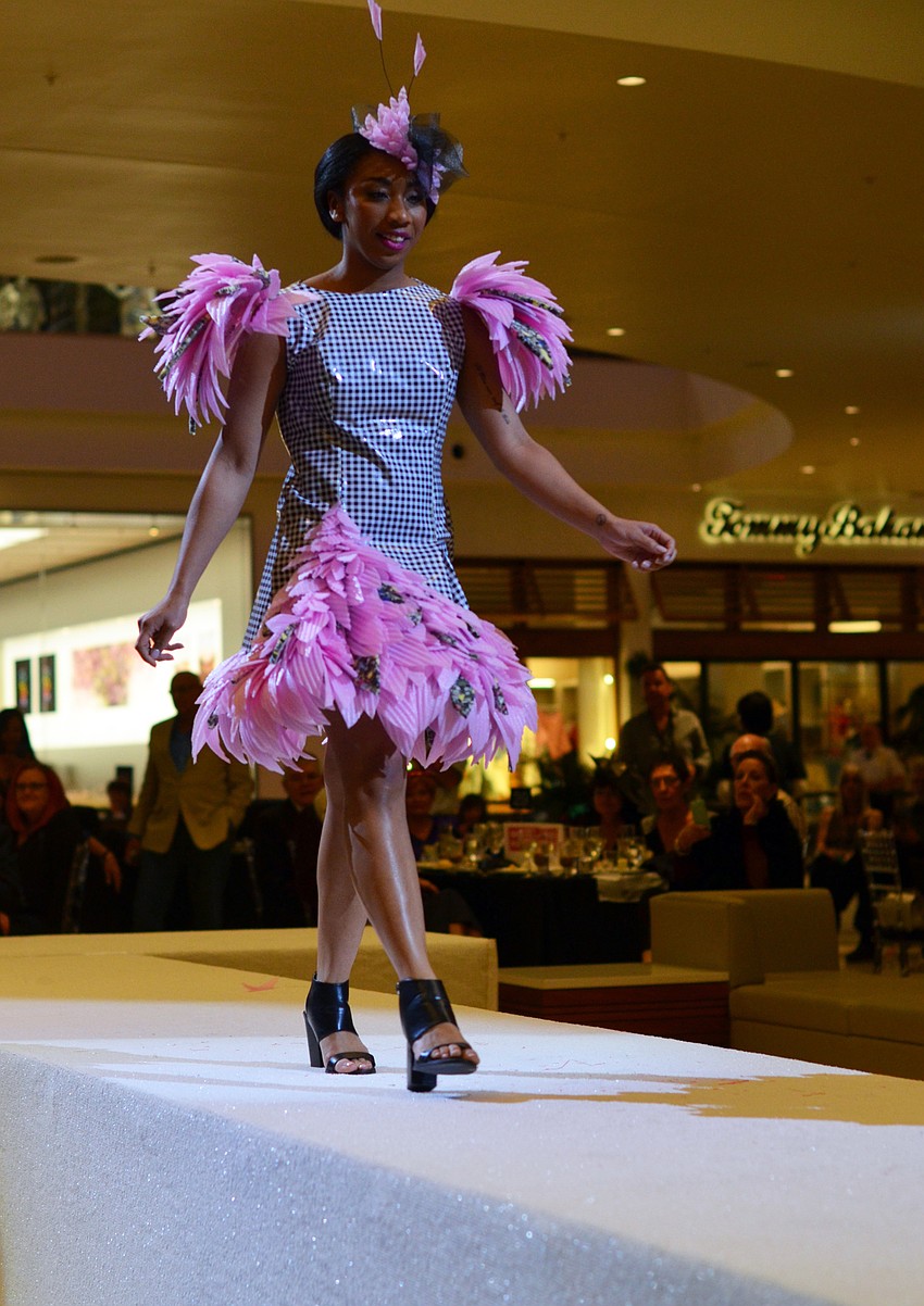 Tianna Boswell models Ellen Rose, Taylor Klar and Poppy Moore's 'Pique-Nique' — made from vinyl table cloth, insulating foam strip and carpet lining cushion