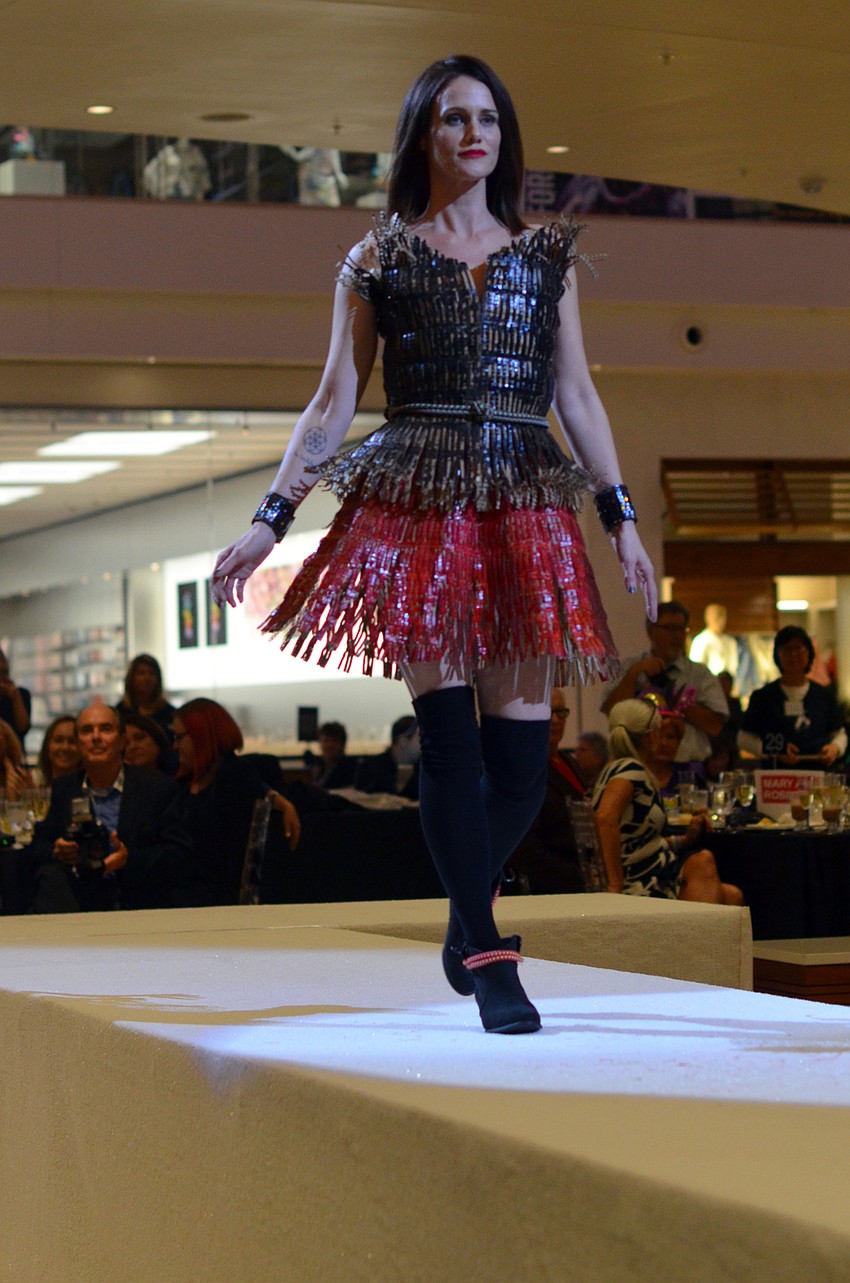 Traci Jackson models Pamela Sumner's 'Flapper Update' — made from cardboard, bungee cords and house paint