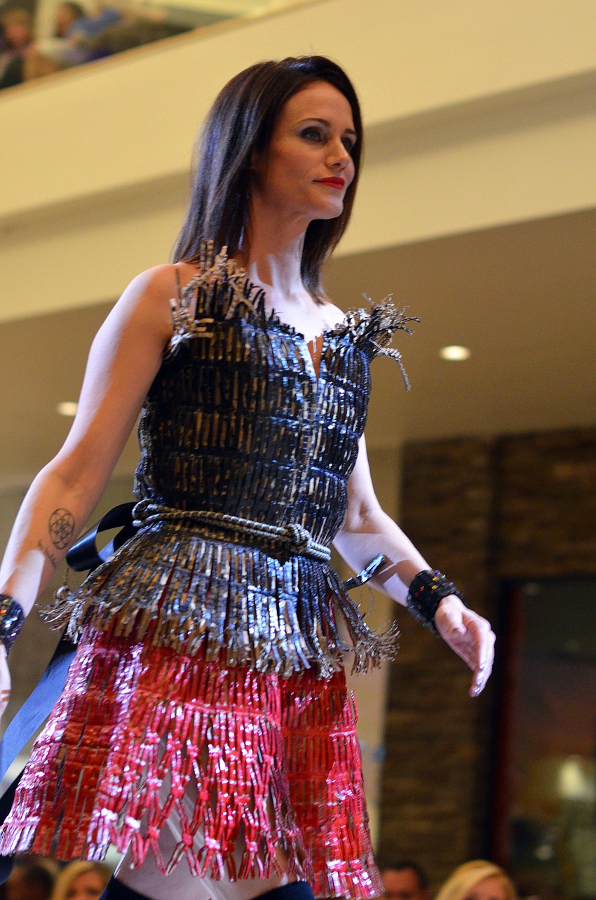 Traci Jackson models Pamela Sumner's 'Flapper Update' — made from cardboard, bungee cords and house paint