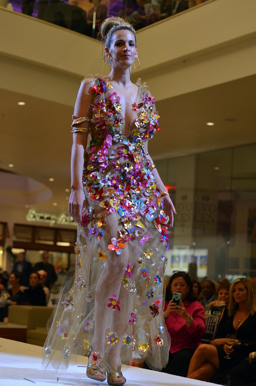 Liz Dobbins models Pamela Sumner's 'Dessert, Anyone?' — made from candy wrappers and snack food packaging