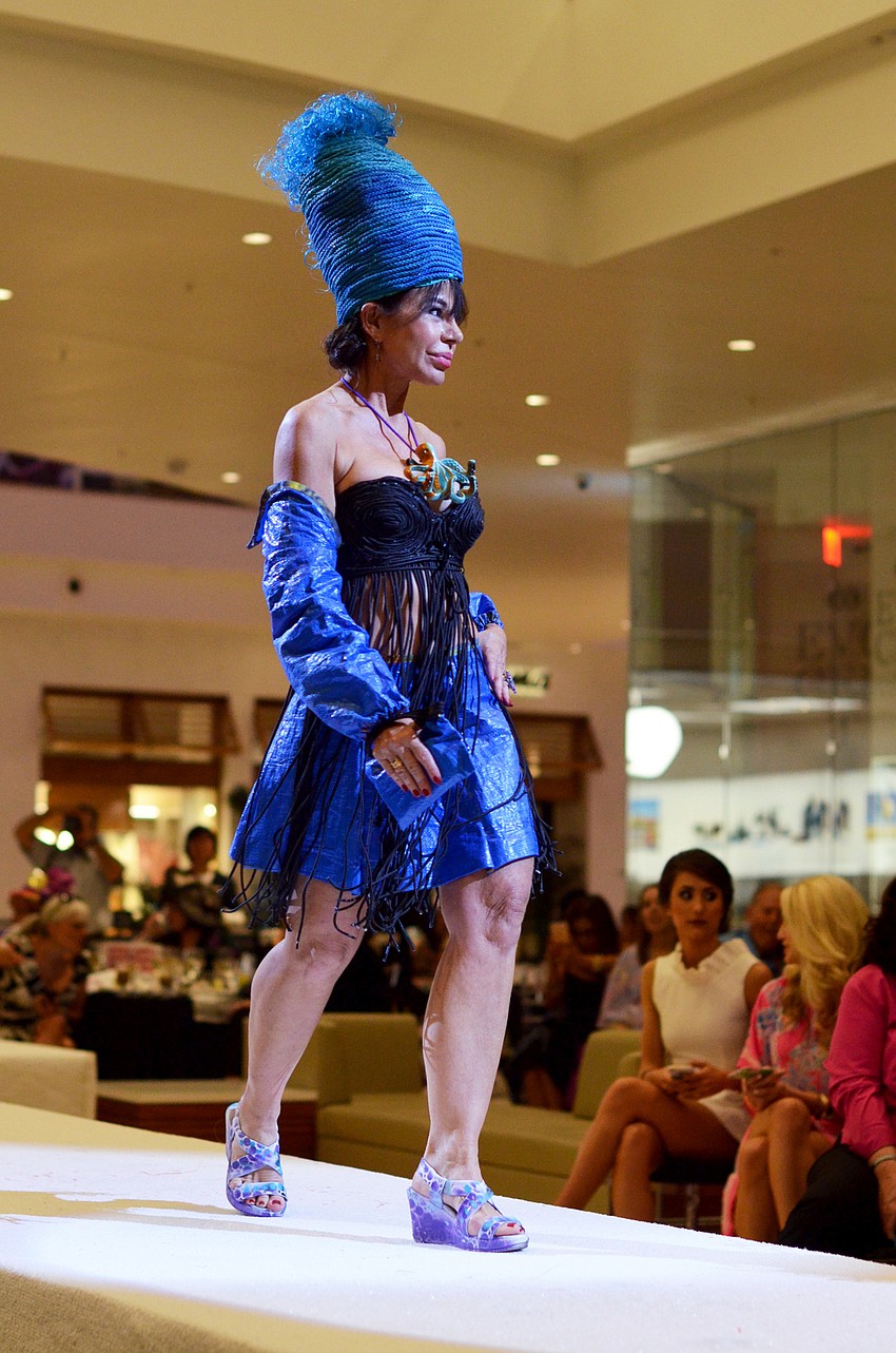 Anita Wexler models her own 'Home De Poe' — made from blue industrial tarp and ropes