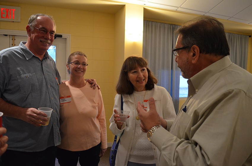 Sarasota County Commissioner Al Maio catches up with Harry and Angela Lazear and Vivian Laschinski.