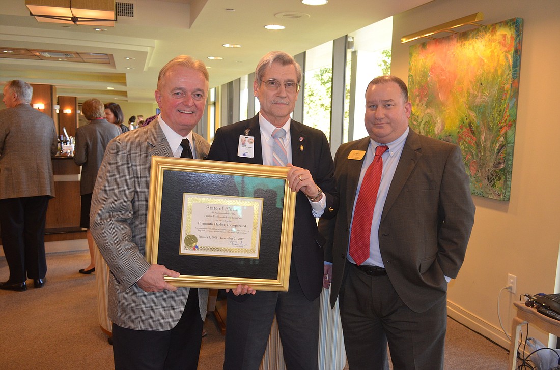 Plymouth Harbor President and CEO Harry Hobson, Field Office Manager Jon Seehawer, of the Florida Agency for Healthcare Administration, and Vice President of Health Services Joe Devore, of Plymouth Harbour