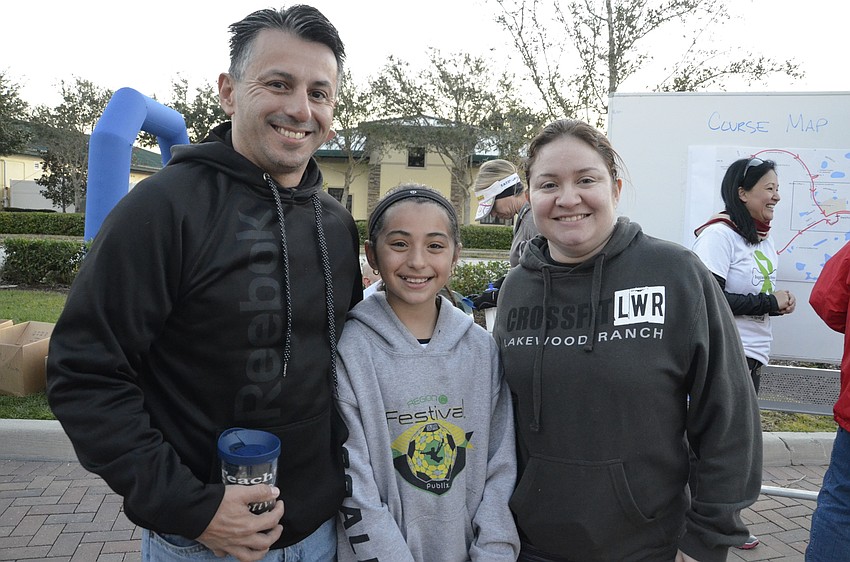 Ricardo and Sophia Diaz of Lakewood Ranch and Patty Yero with LWR Crossfit