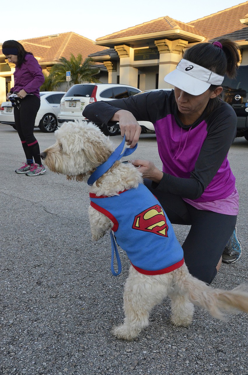 Sully gets suited up by Leslie Coyn of Lakewood Ranch.