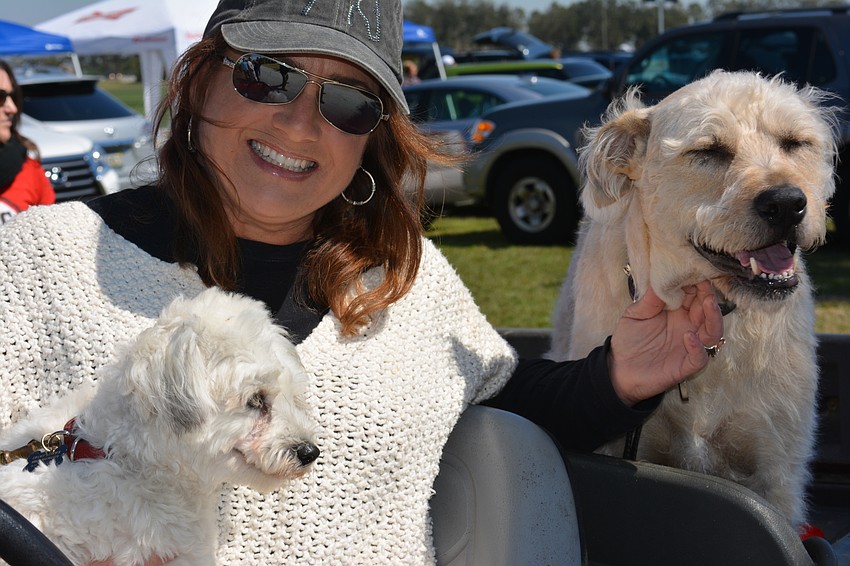Event Co-Chair Jaymie Klauber brought her dogs Robbie and Levi, who she adopted from Nate's Honor Animal Rescue.