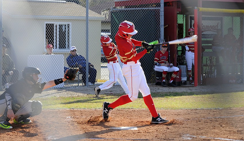 Cardinal Mooney senior Tyler Mattes makes contact in the second inning.