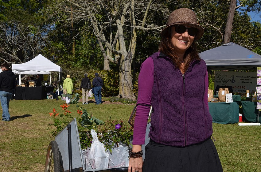 Tanya Radtke-Klenk hauls away the new additions for her home garden.