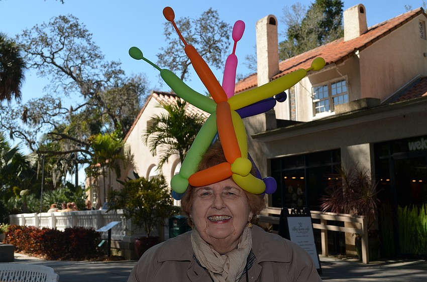 Pat Bonarek sports her whimsical hat made out of balloons.