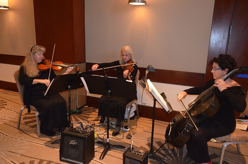 Romanza Strings performs.