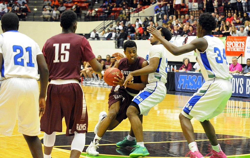 Riverview guard Brion Whitley drives to the hoop in the second quarter.