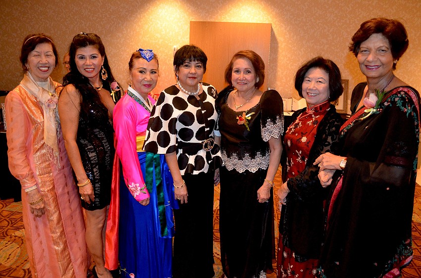 Asian Women's Club of Lakewood Ranch members Dr. Caring Santos, Tina Harrison, Tina Oakes, Vicky Imperial-Hubert, Maria Cora Gaffar, Teresa Haddock and Lilly Chaddha show off their formal wear.