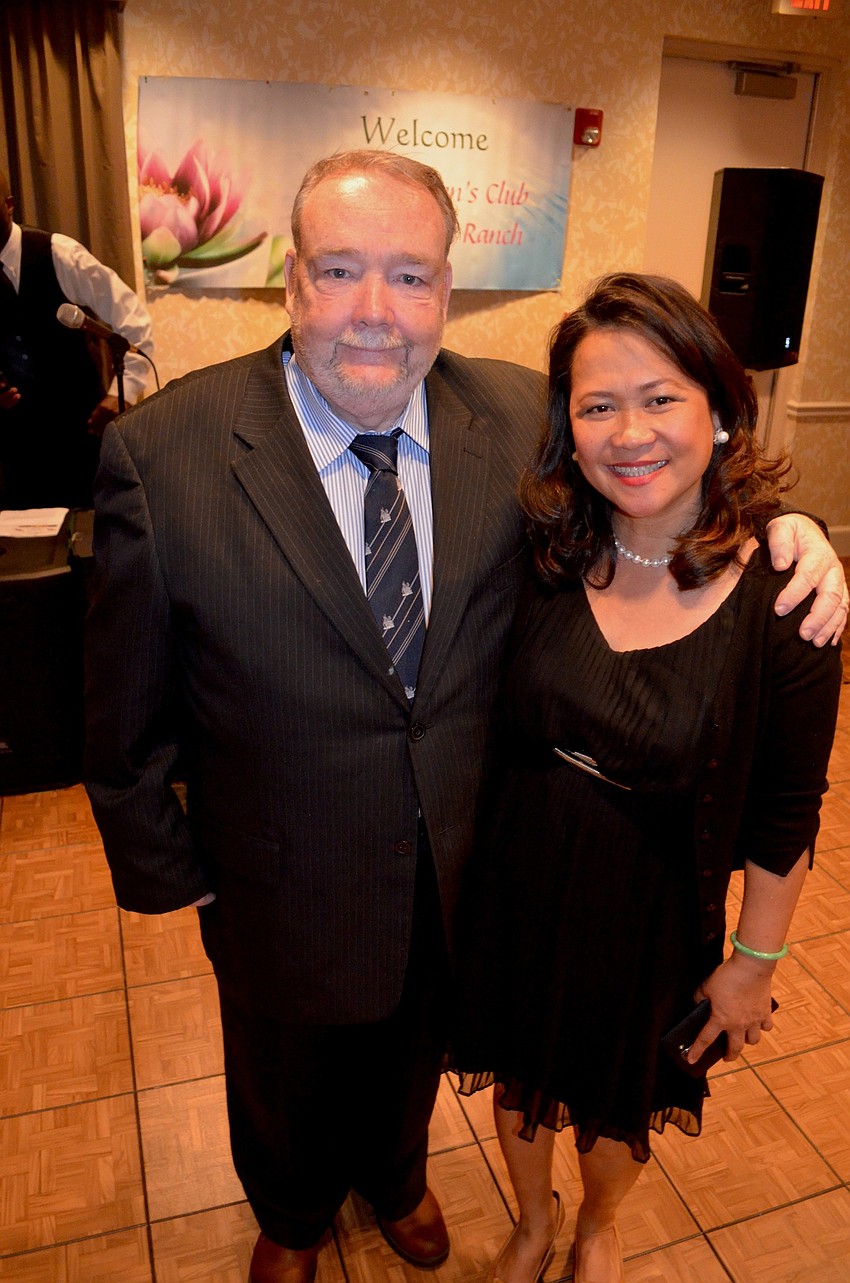 Robert and Regina McKenna mingle with friends.