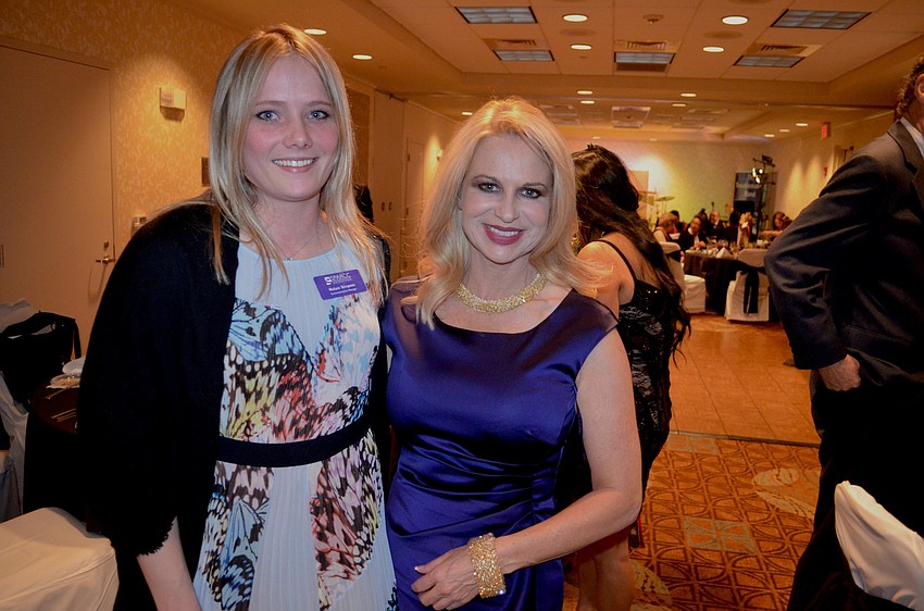 Nalani Simpson, of SPARCC, makes new friends, such as Dylan Sanders.