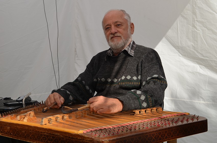 Vladimir Gorodkin provides music from the instrument called the  tsimbaly.