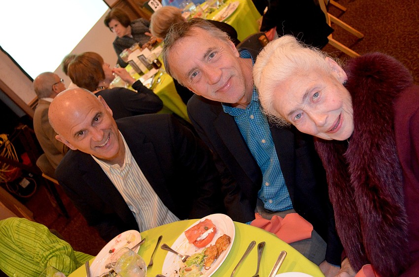 Charlie Huisking, Jeff Sebeika and Eva Slane dig in to breakfast.