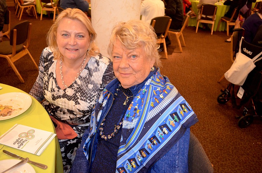 Gal pals Chris Devereaux and Chris Koski chat with friends.