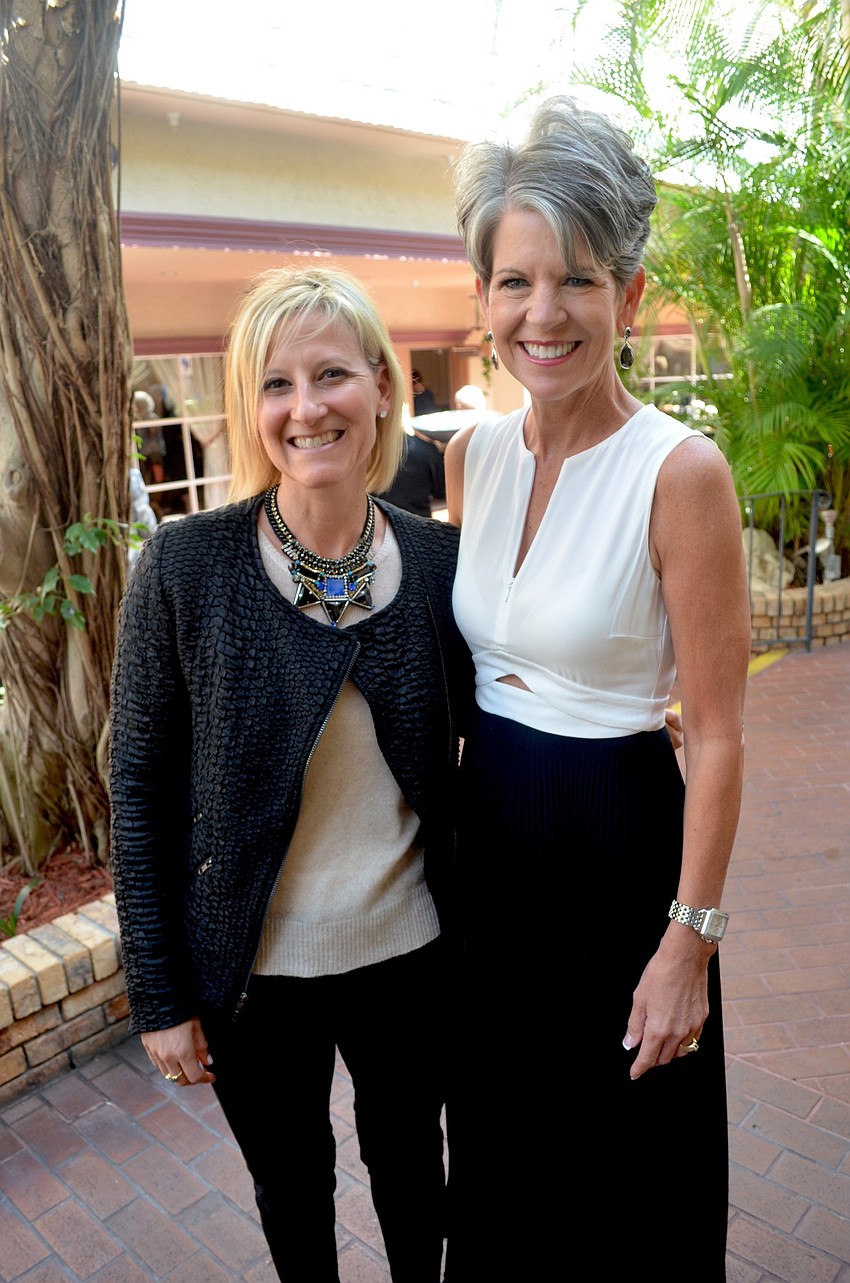 Lauren Fineman and Sally Schule, of Saks Fifth Avenue, dress for the occasion.