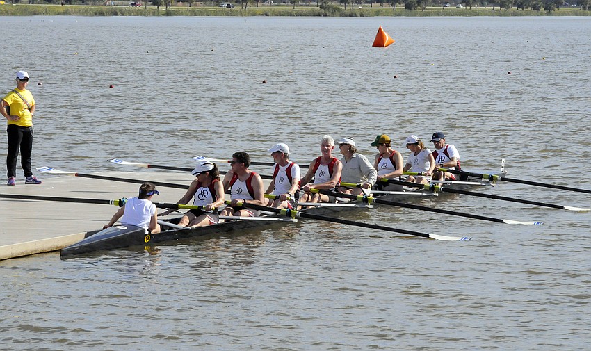Members of the Indianapolis Rowing Club take the water in preparation for the final race of the day: the Mixed Masters 8+.