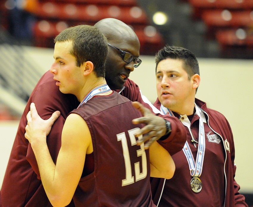 Riverview senior Dom Caldwell receives his state runner-up medal.