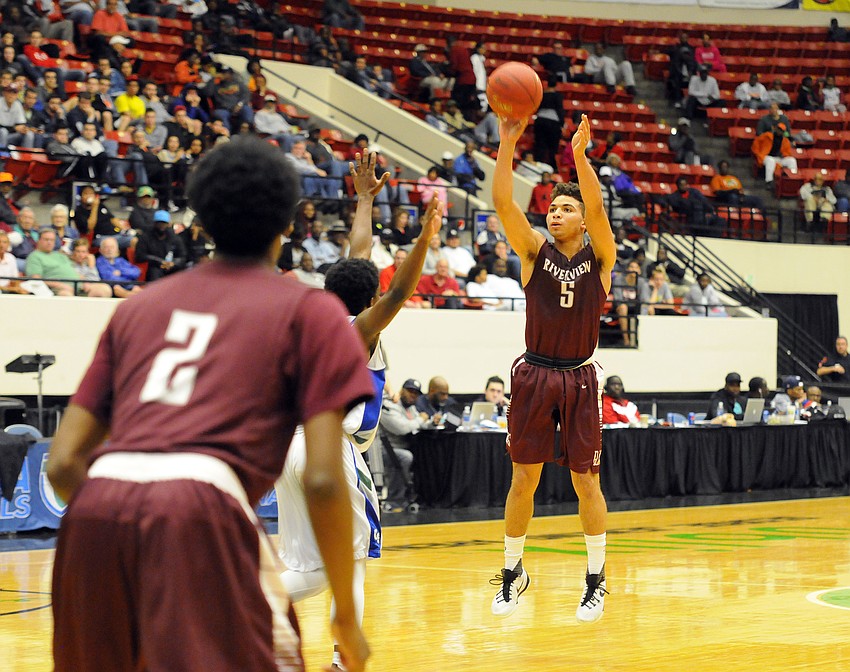 Riverview point guard D.J. Bryant attempts a shot in the first half.