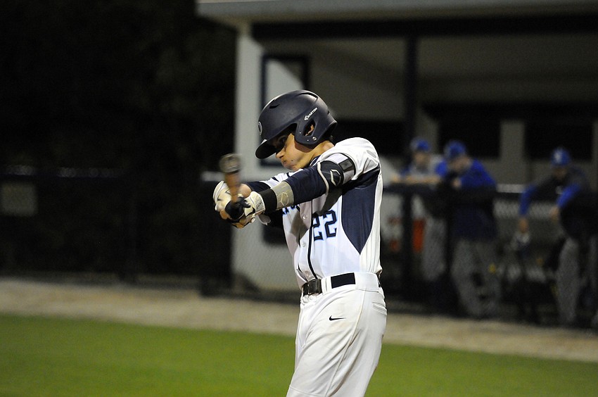 ODA junior shortstop Cameron Smalley takes a practice swing before stepping into the batter's box.