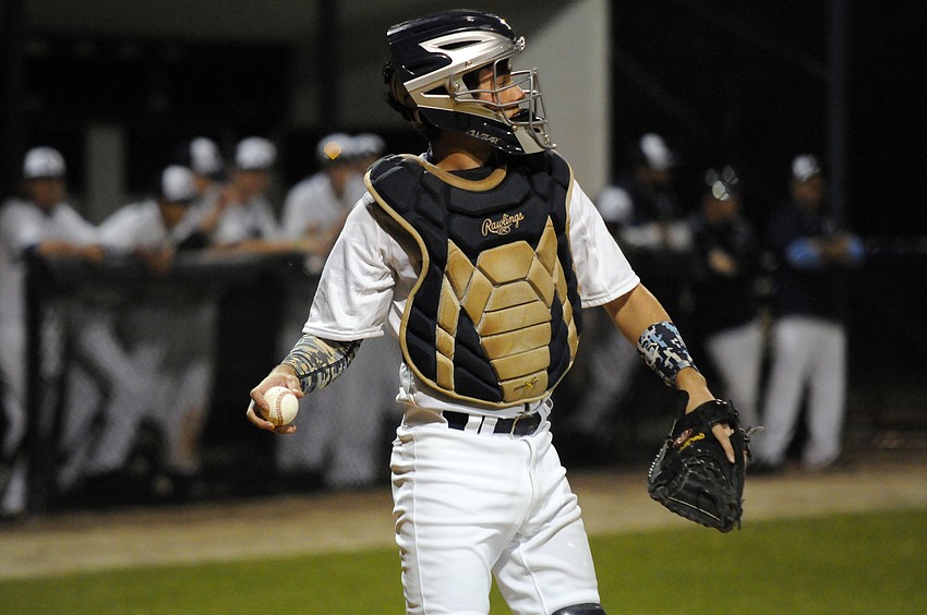 ODA catcher Parke Phillips prepares to throw the ball back to the mound.