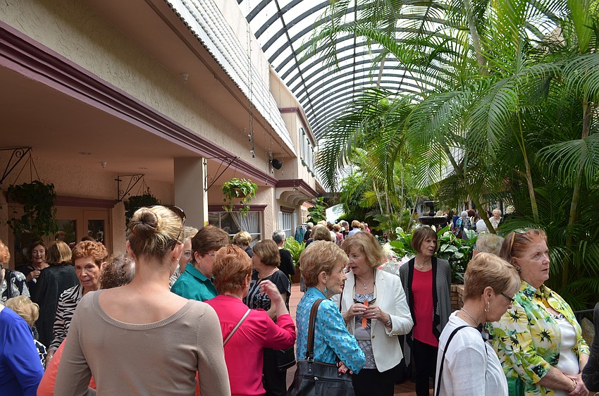 Ladies of St. Thomas More gathered for the Spring Fling fashion show Monday at Michael's On East.