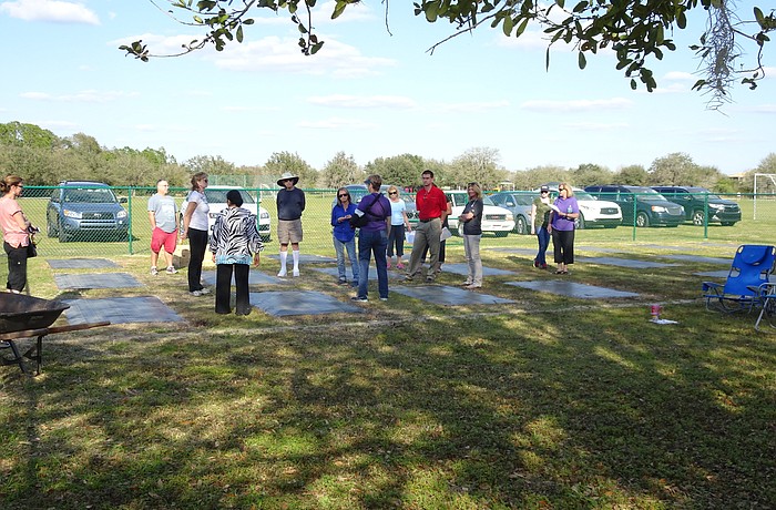 Master Gardener Lori Walker holds a meeting on site with participants. Courtesy photo.