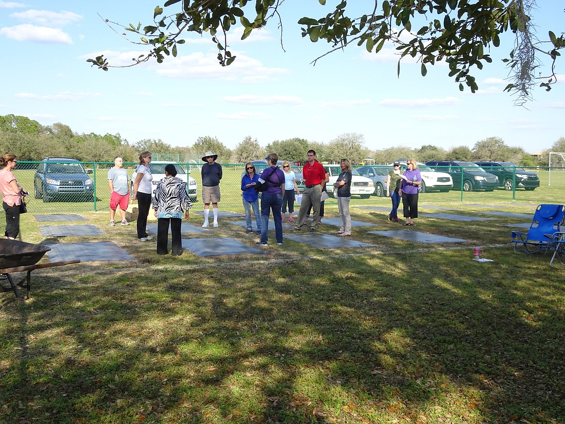 Master Gardener Lori Walker holds a meeting on site with participants. Courtesy photo.