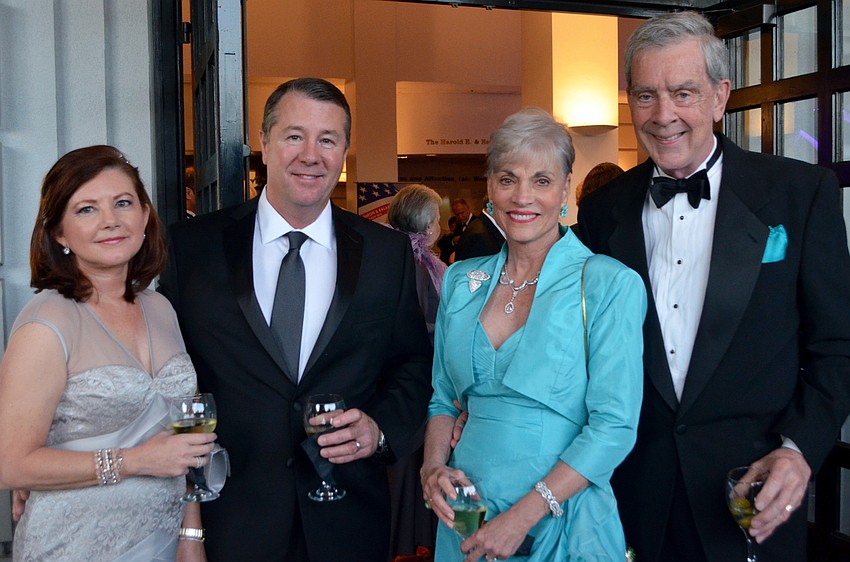 Melanie and Tim Hensey with Diane and Bob Roskamp