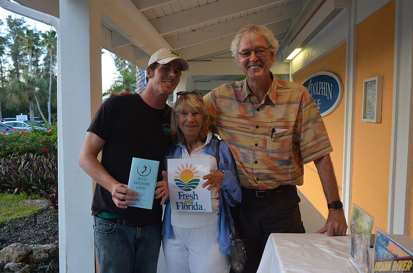 Kip O’Neill, center, with Robbie and Rob Ball, of the Blue Dolphin Café