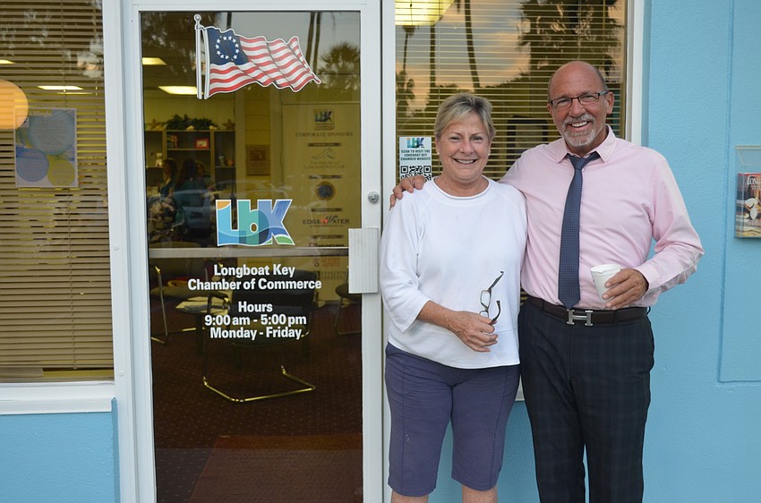 Chamber of Commerce President Gail Loefgren and Richard Perlman, of Michael Saunders & Co.