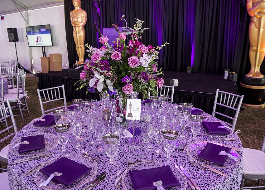 Beautiful tent and table decor with catering by Michael's On East