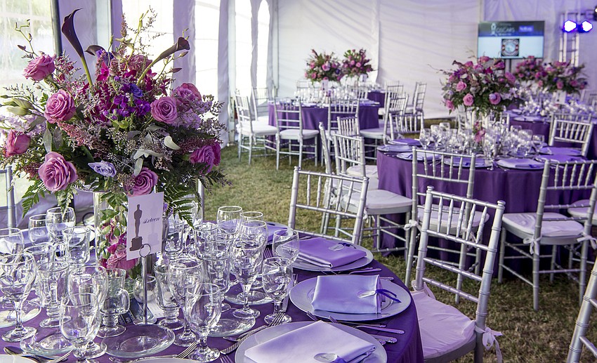 Beautiful tent and table decor with catering by Michael's On East