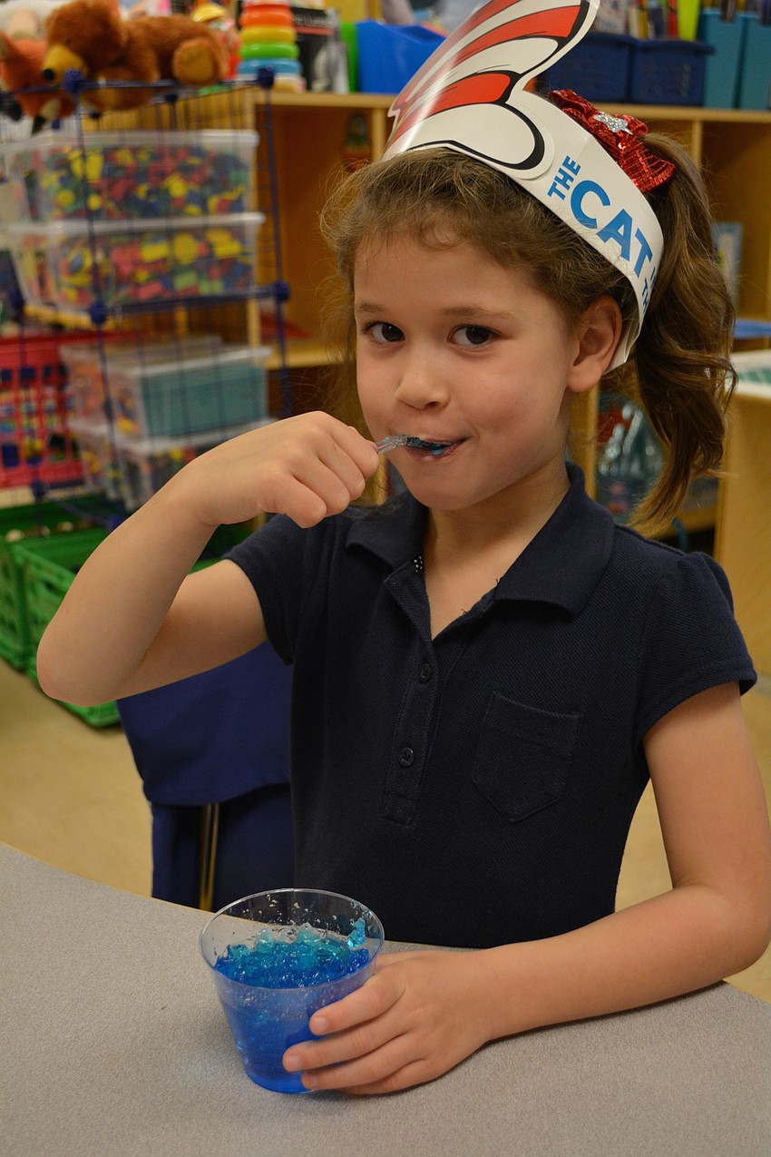 Braden River Elementary kindergartener Ashlyn McBride tries red fish in blue Jello.