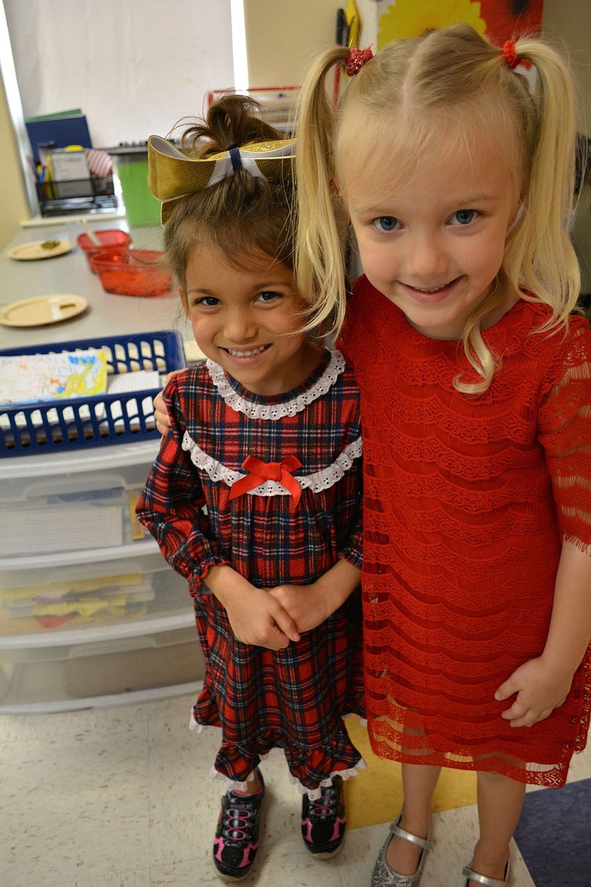 Kiddie Academy's Haylie Thompson and Olivia Drobny, both 5, came as Cindy Lou Who.