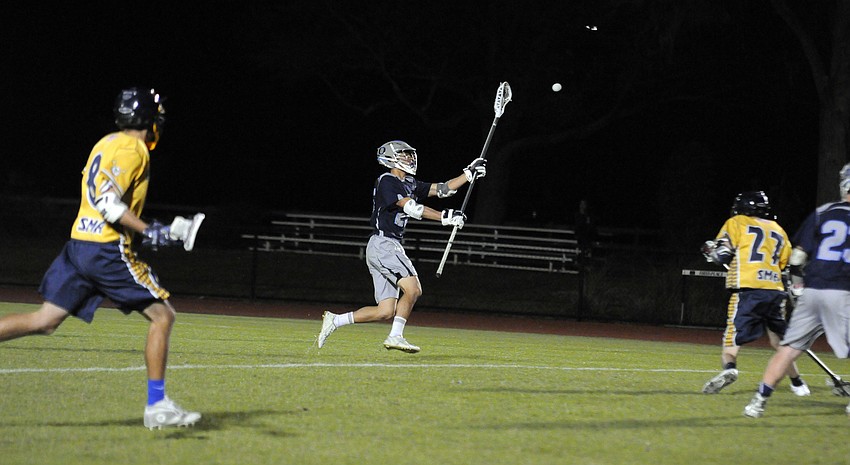 ODA senior Owen Han controls the ball for the Thunder in the first period.