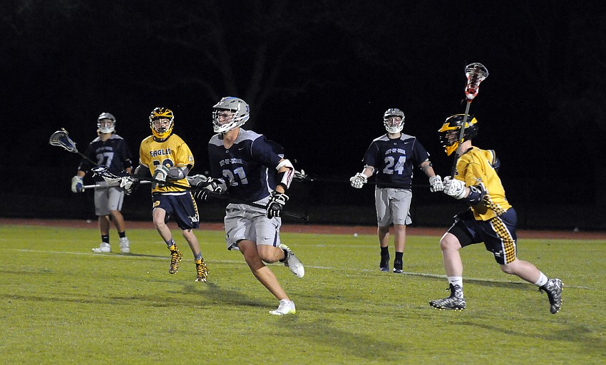 ODA junior Laszlo Tengerdy carries the ball down the field versus Sarasota Military Academy.